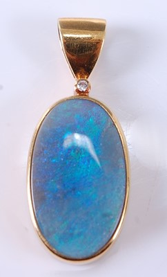 Lot 2611 - A yellow metal, black opal and diamond pendant,...