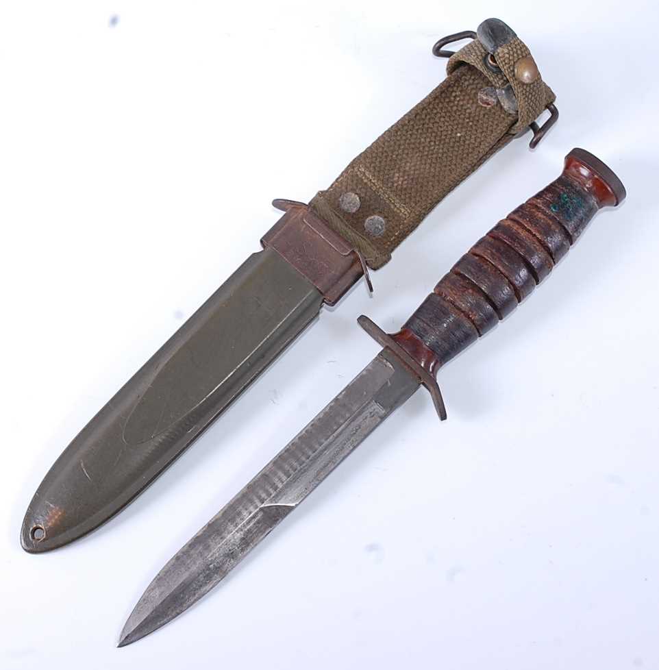 Lot 138 - A US Army M3 trench knife, having a 16.5cm...
