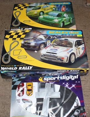 Lot 1406 - a large group of 3 Scalextric racing sets to...