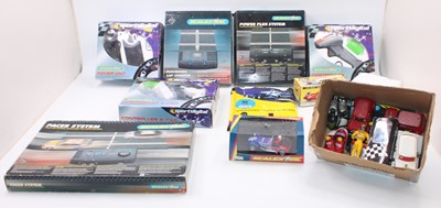 Lot 1408 - A box of Scalextric accessories and some loose...