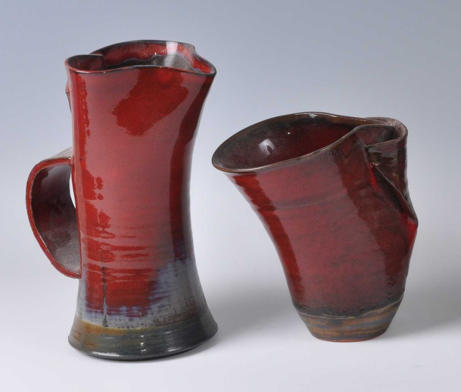 Lot 151 - Berthe Wallis (1936-2019) - a red glazed...