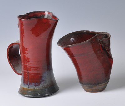 Lot 151 - Berthe Wallis (1936-2019) - a red glazed...