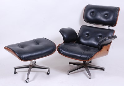 Lot 598 - After Charles & Ray Eames - a lounge chair and...