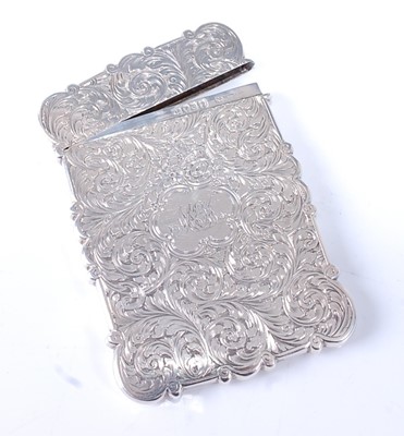 Lot 2140 - A Victorian silver hinged card case, of shaped...