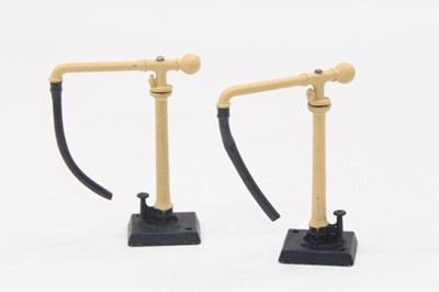 Lot 643 - Two Hornby Dublo buff coloured water cranes (E)