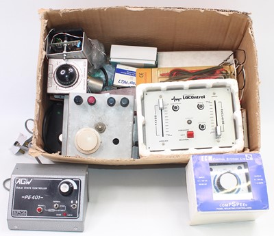 Lot 431 - A box containing a number of controllers,...