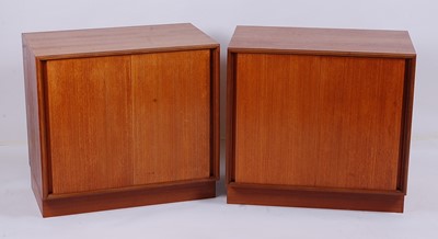 Lot 532 - A pair of 1970s G-Plan teak low double door...