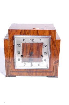 Lot 8 - A 1930s oak cased mantel clock, the eight day...