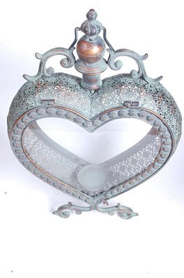 Lot 9 - A pair of modern copper-effect heart shaped...