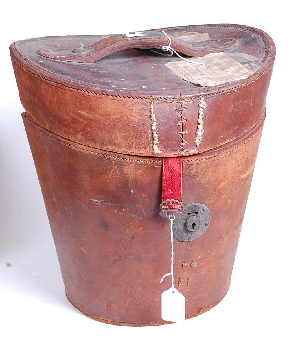Lot 15 - A Victorian tan leather top-hat box, with...