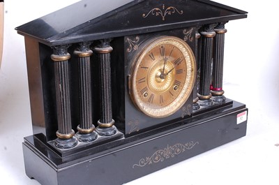 Lot 32 - A Victorian black slate mantel clock, of...