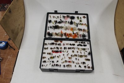 Lot 181 - A box containing a collection of fishing...