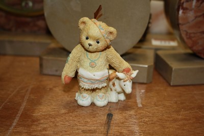 Lot 184 - A collection of Cherished Teddies resin...