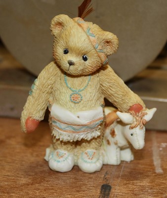 Lot 184 - A collection of Cherished Teddies resin...