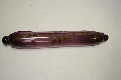 Lot 90 - A 19th century Nailsea type glass rolling pin,...
