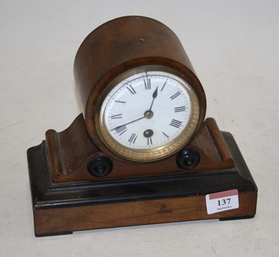 Lot 137 - A Victorian walnut cased mantel clock, the...