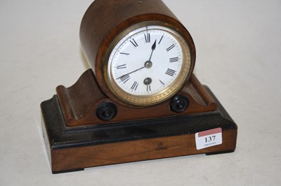 Lot 137 - A Victorian walnut cased mantel clock, the...