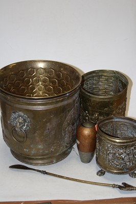 Lot 138 - A 20th century repoussee decorated brass coal...