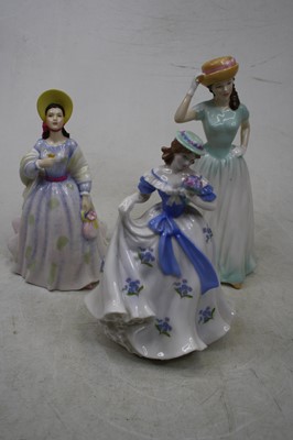 Lot 64 - A collection of porcelain figures, to include...