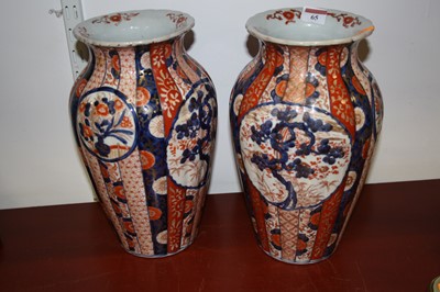 Lot 65 - A pair of Japanese Taicho period Imari palette...