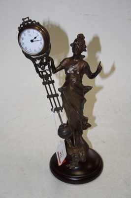 Lot 216 - A modern Spelter mystery clock in the form of...