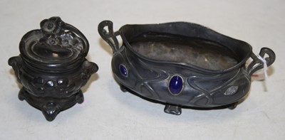 Lot 233 - A small Art Nouveau pewter bowl of shaped oval...