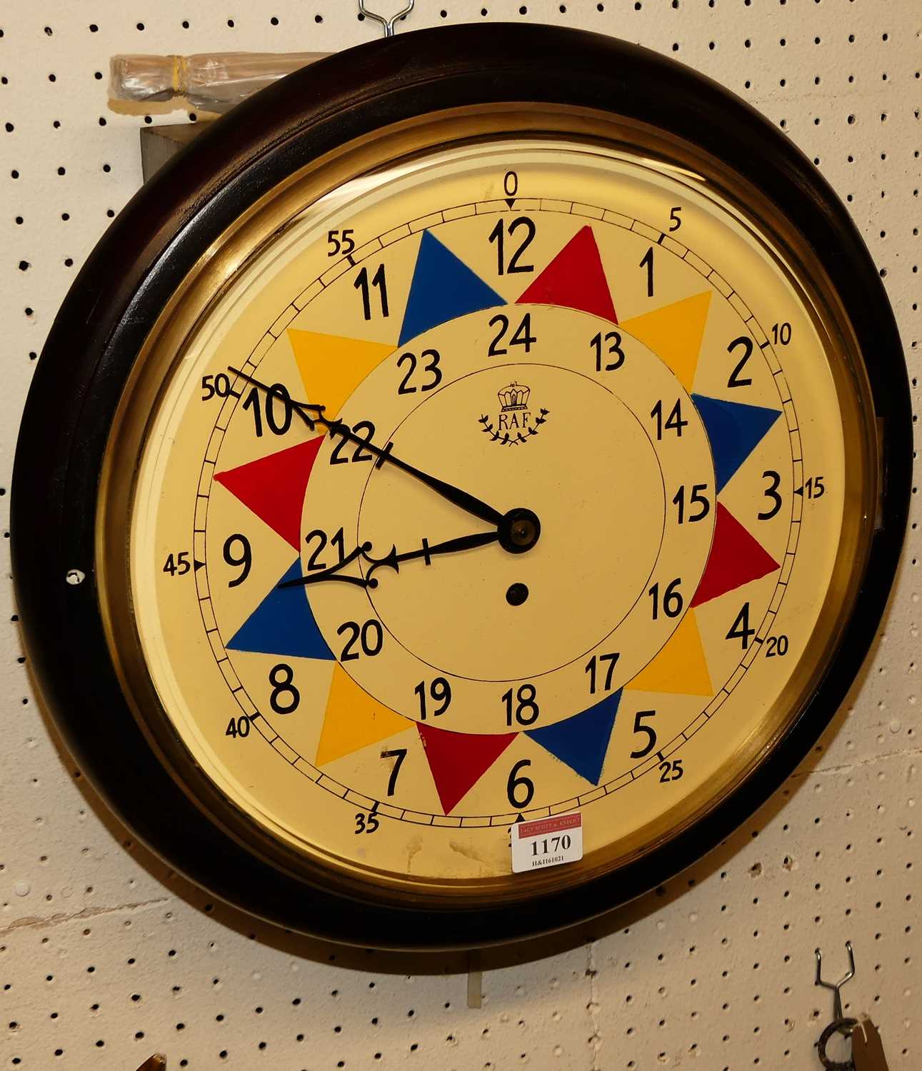 Lot 1170 - A reproduction circular wall clock, bears RAF...