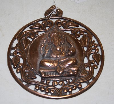 Lot 250 - A copper alloy plaque of circular form, the...