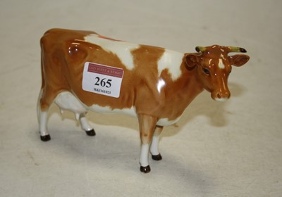 Lot 265 - A Beswick figure of a Guernsey cow, model No....