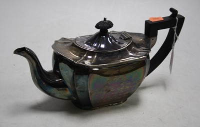 Lot 285 - A George V silver teapot of shaped rectangular...