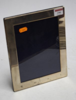 Lot 290 - A modern silver clad easel photo frame of...