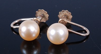 Lot 2696 - A single string of 54 uniform cultured pearls,...