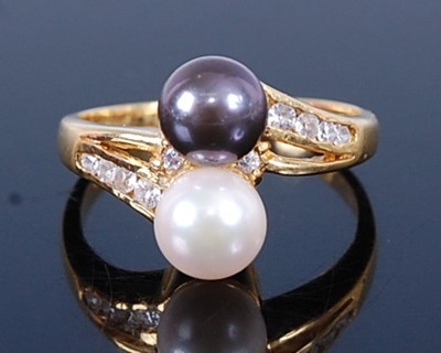 Lot 2711 - An 18ct gold black and white cultured pearl...