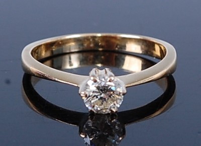 Lot 2653 - A yellow metal diamond single stone ring,...