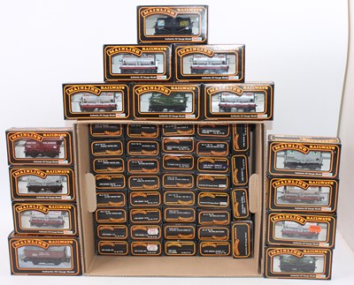 Lot 450 - 50 various boxed Mainline 00 Gauge wagons, all...