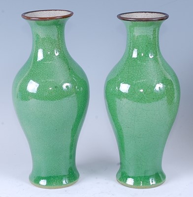 Lot 2452 - A pair of Chinese green ground crackle glaze...
