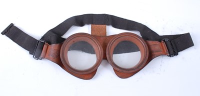 Lot 39 - A pair of WW II diving goggles, the rubber...