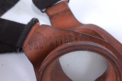 Lot 39 - A pair of WW II diving goggles, the rubber...