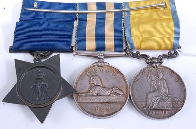 Lot 207 - A group of three campaign medals to include...