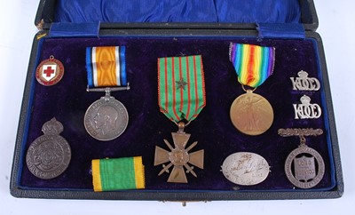 Lot 72 - A collection of medals and badges to include...
