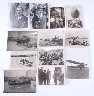 Lot 74 - A collection of WW II period photographs to...