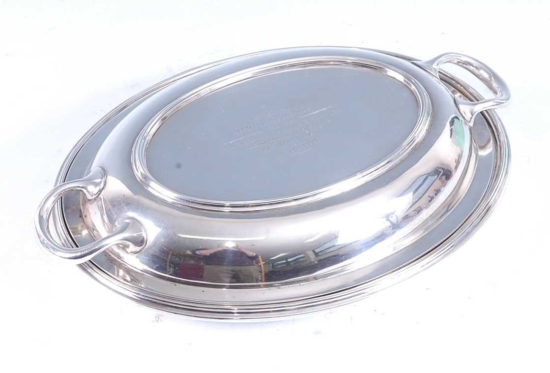 Lot 2150 - A George V silver entree dish and cover with...