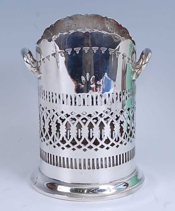 Lot 2263 - A George V silver wine bottle sleeve, of...