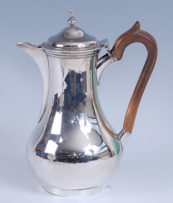 Lot 2156 - A George III silver hot water pot, of baluster...