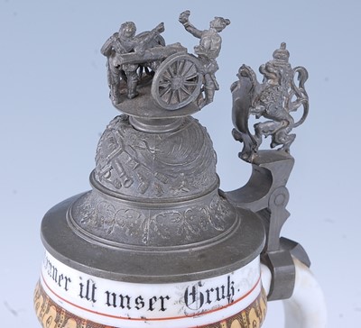 Lot 128 - A German porcelain beerstein, painted and...