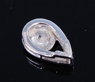 Lot 2722 - An 18ct white gold diamond pendant, comprising...