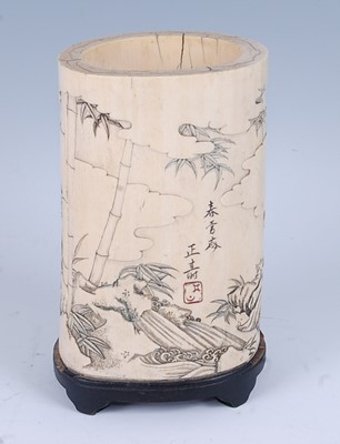 Lot 2463 - A Japanese Meiji period carved ivory brush pot,...