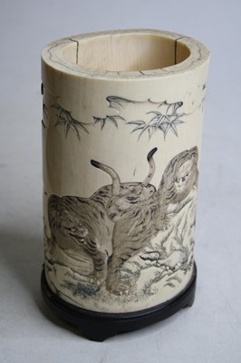Lot 2463 - A Japanese Meiji period carved ivory brush pot,...