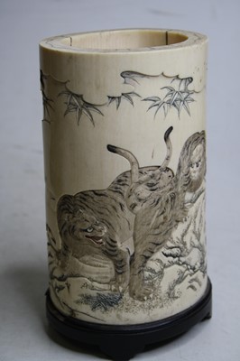 Lot 2463 - A Japanese Meiji period carved ivory brush pot,...