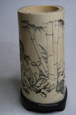 Lot 2463 - A Japanese Meiji period carved ivory brush pot,...